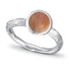 Organic ring in 585 white gold with a narrow band and an 8 mm Quartzite - a reddish stone from Northern Norway.